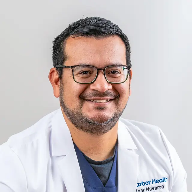 Edgar Garza,  MD