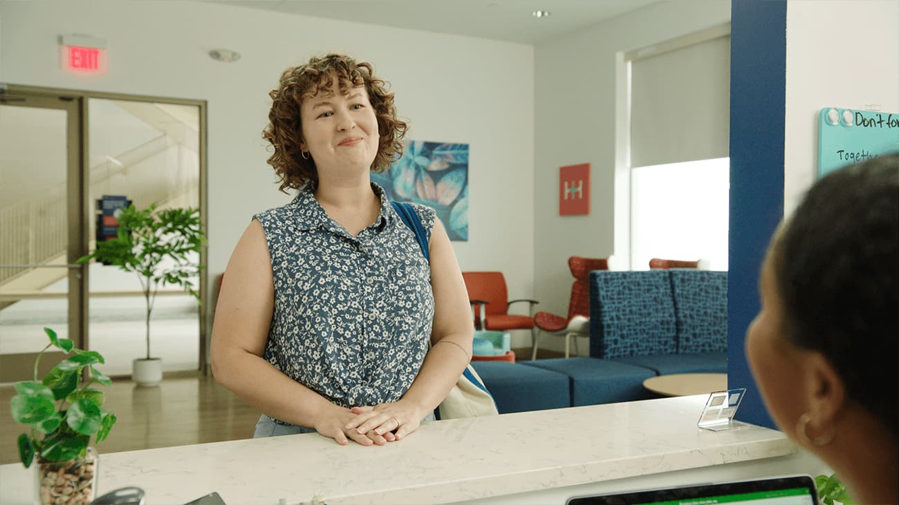 smiling-front-desk-lady